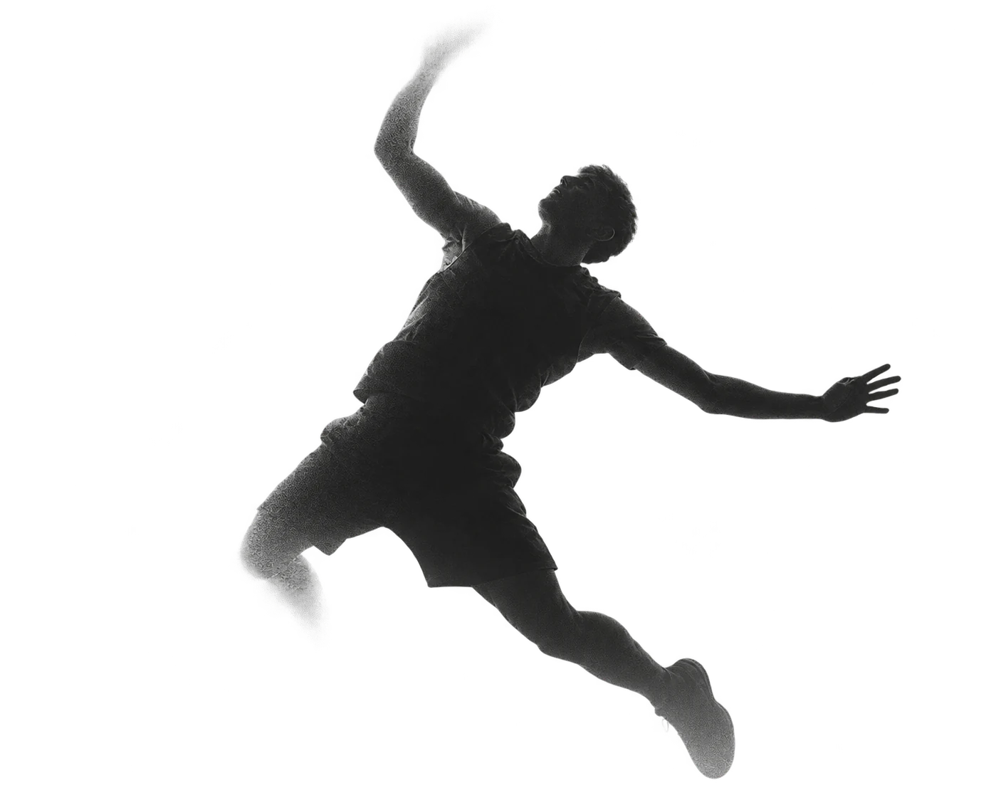 Badminton player executing a powerful jump smash